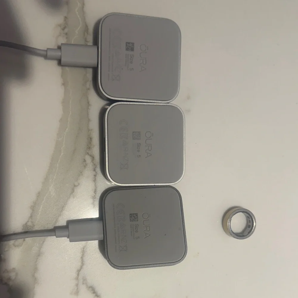 Oura ring gen 4. ring size 5. 3 charging docks included